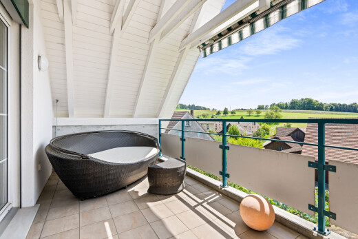 balcony featuring golf course view