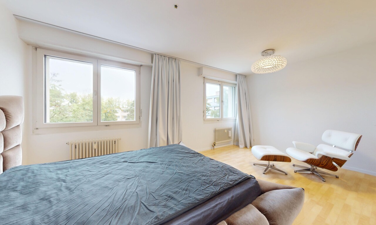 room featuring radiator heating unit and wood finished floors