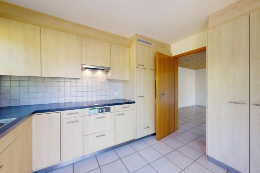 küche mit dark countertops, arbeitsplatten, light brown cabinets, hellbraune schränke, und light floor