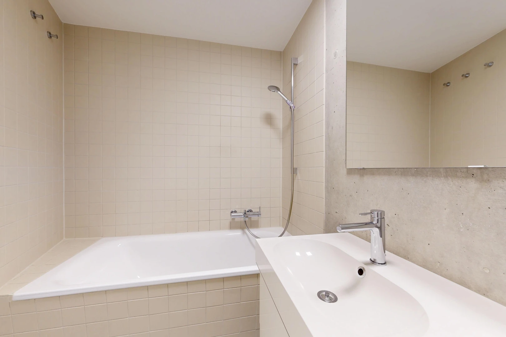 full bath with vanity and tiled shower / bath combo