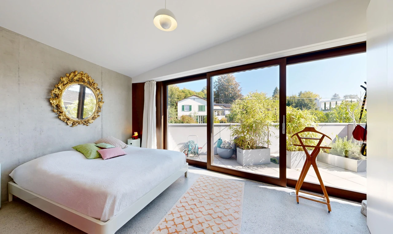 room / bedroom featuring access to outside and lofted ceiling