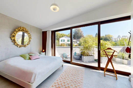 room / bedroom featuring access to outside and lofted ceiling