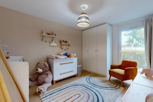 room / bedroom with light wood finished floors and a closet