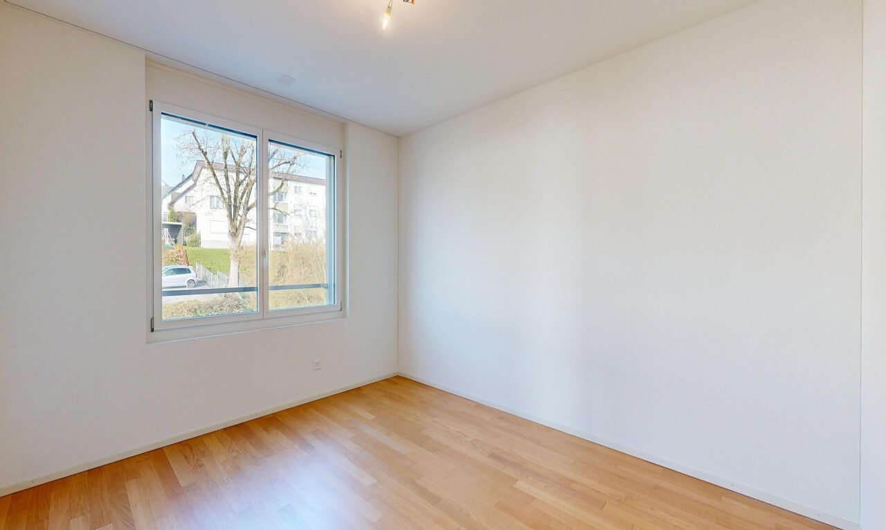 pièce vide avec cloison sèche, drywall, sol en finition bois, wood finish floor, et inside property