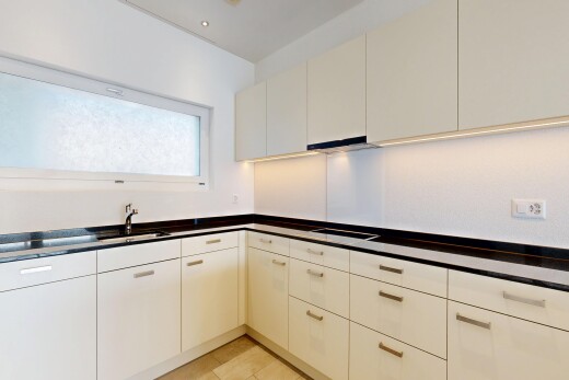 küche mit arbeitsplatten, dark countertops, light floor, natürliches licht, und natural light