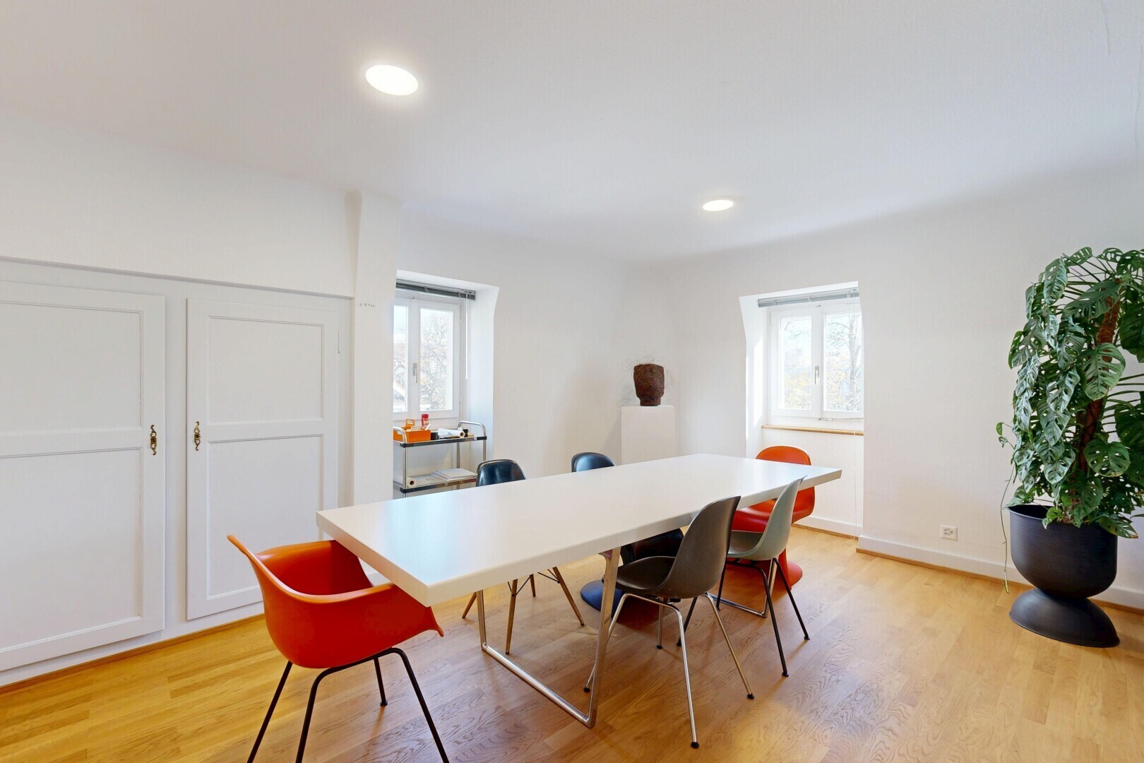 dining space with light wood finished floors, healthy amount of natural light, and recessed lighting
