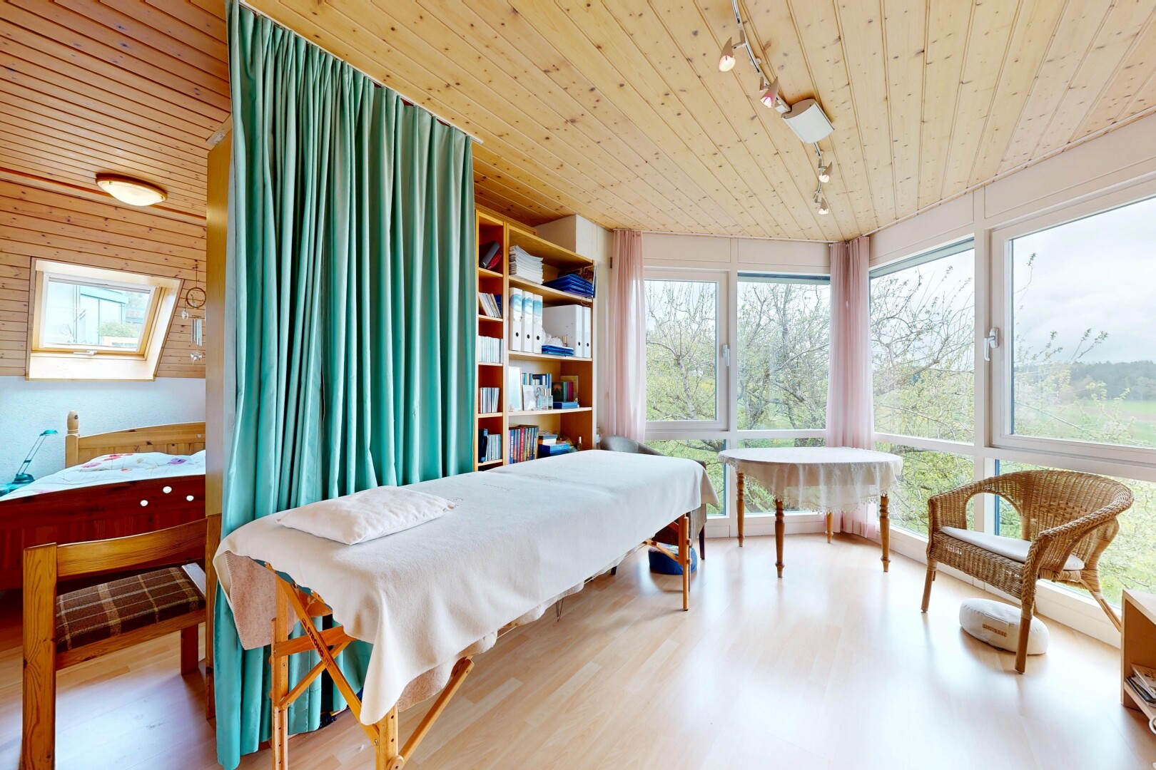 room / bedroom featuring wooden ceiling, track lighting, and wood finished floors