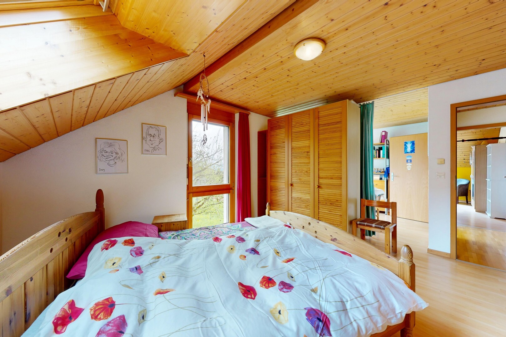 room / bedroom featuring wood ceiling, wood finished floors, a closet, and freestanding refrigerator