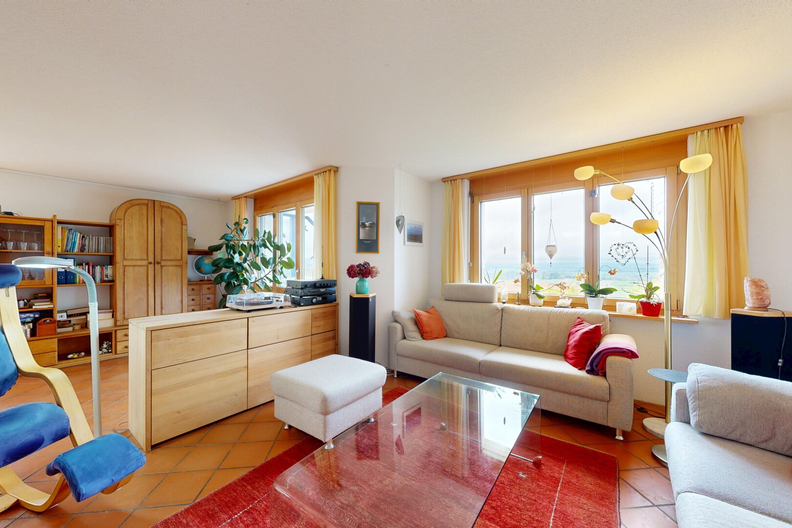 living area featuring light tile patterned flooring