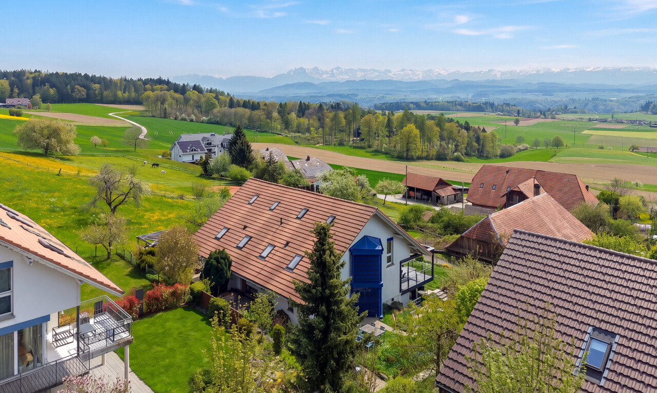 view of property featuring a rural view and a mountain view