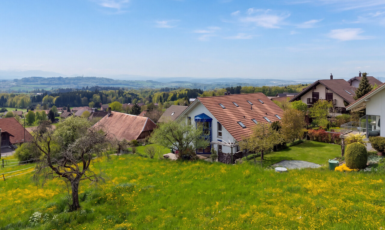 view of home featuring a yard