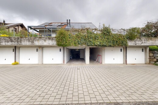 view of property with roof mounted solar panels