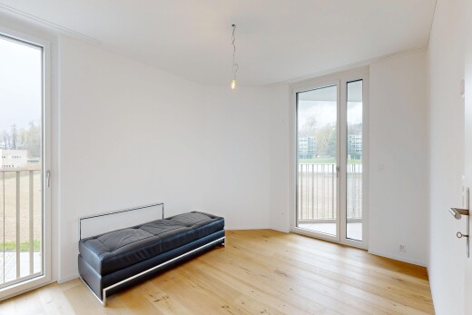 chambre avec accès à l'extérieur, inside property, drywall, cloison sèche, et wood finish floor
