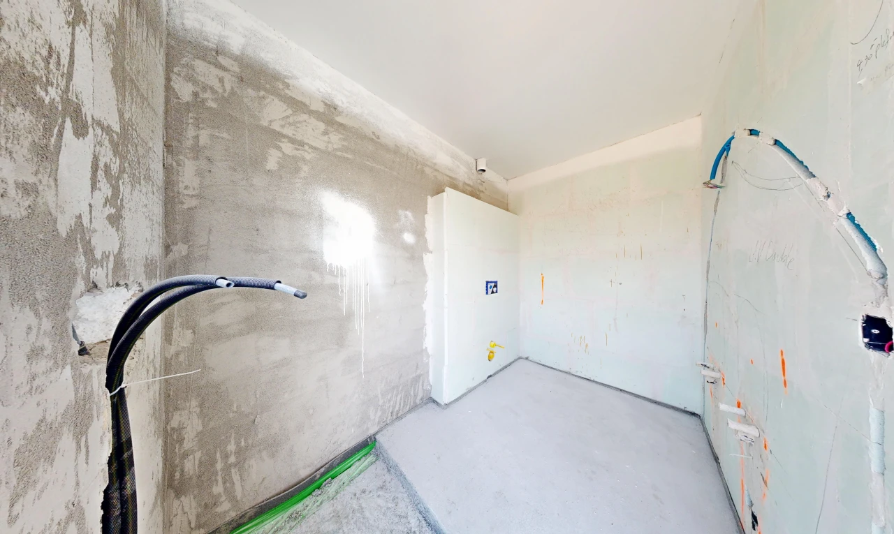 pièce vide avec concrete floor, sol en béton, et inside property