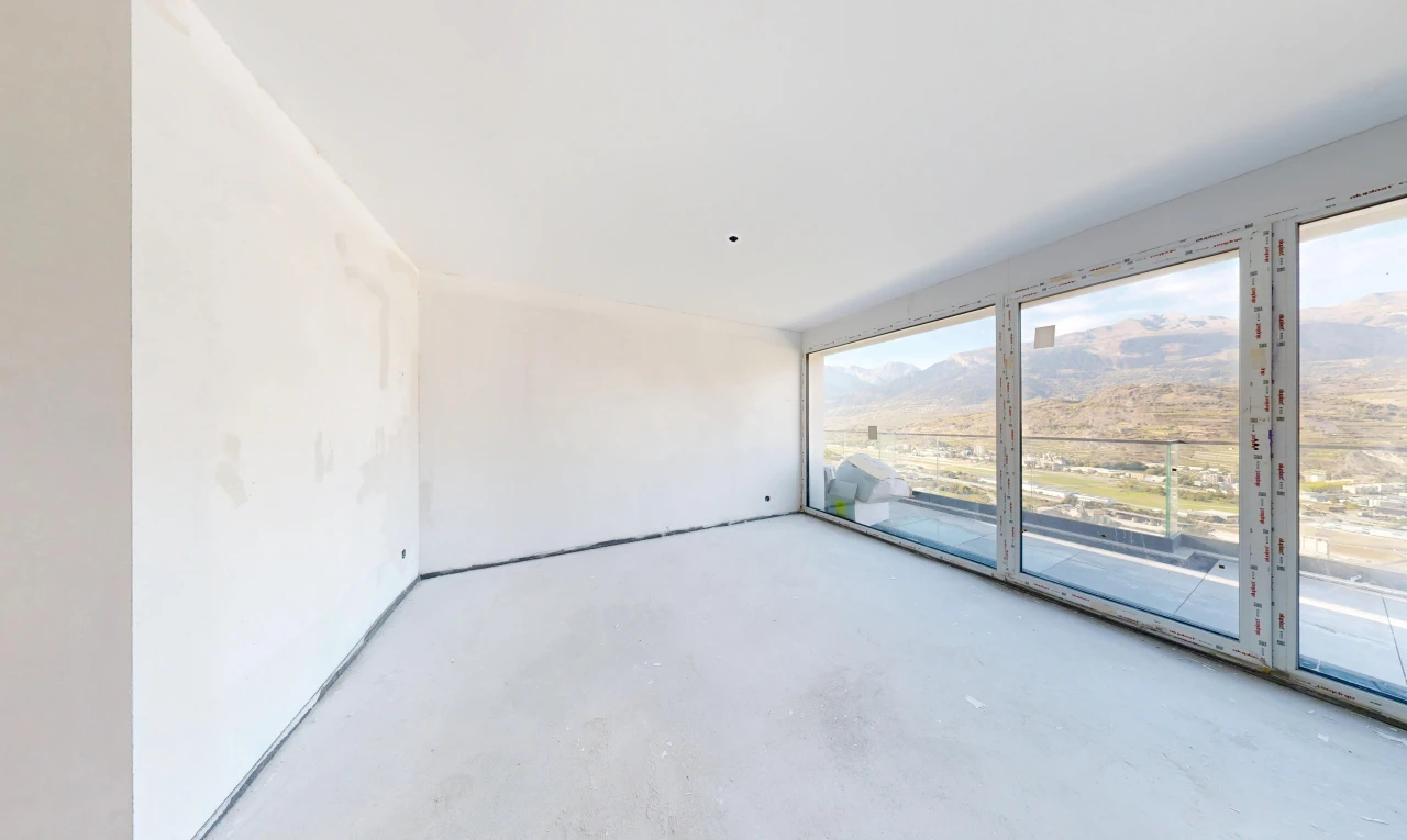 pièce vide avec inside property, sol en béton, concrete floor, cloison sèche, et drywall