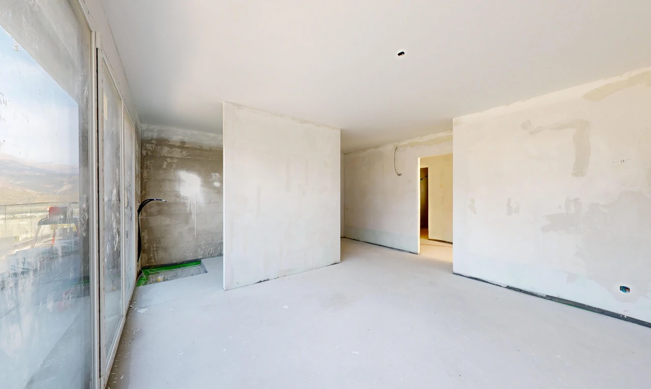 pièce vide avec concrete floor, sol en béton, et inside property