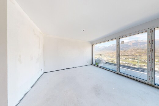 pièce vide avec inside property, sol en béton, concrete floor, cloison sèche, et drywall