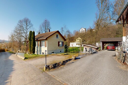 view of property featuring driveway
