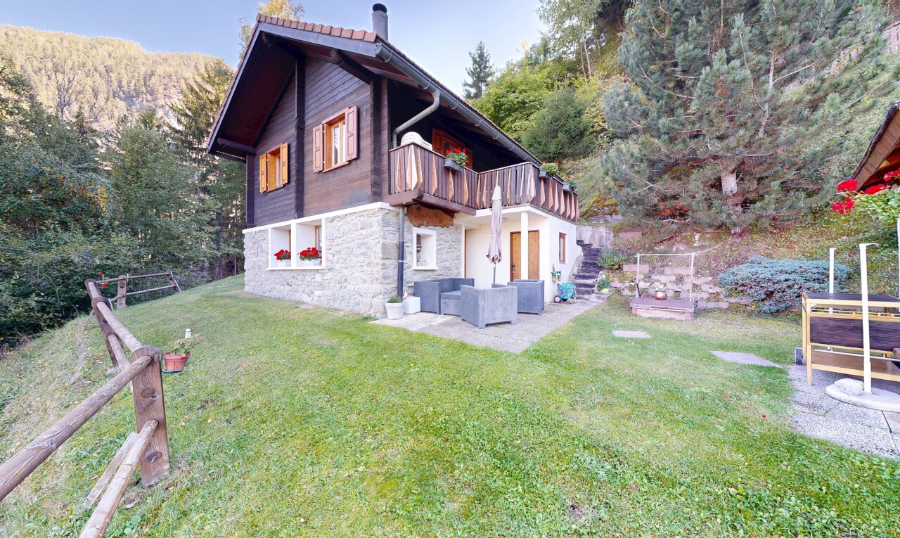 außenansicht mit terrasse, steinverkleidung, property visible, wohnraum im freien, und deck