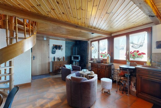 tiled living room featuring stairs, a wood ceiling with exposed beams, and a wood stove