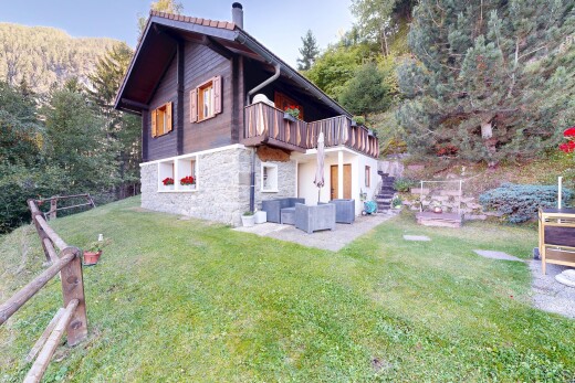 außenansicht mit terrasse, steinverkleidung, property visible, wohnraum im freien, und deck