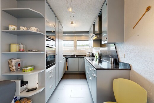küche mit arbeitsplatten, dark countertops, light floor, offene regale, und open shelves