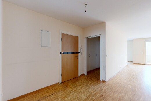 pièce vide avec cloison sèche, drywall, sol en finition bois, wood finish floor, et inside property