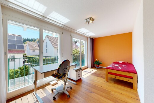 room with access to outside and light wood-type flooring