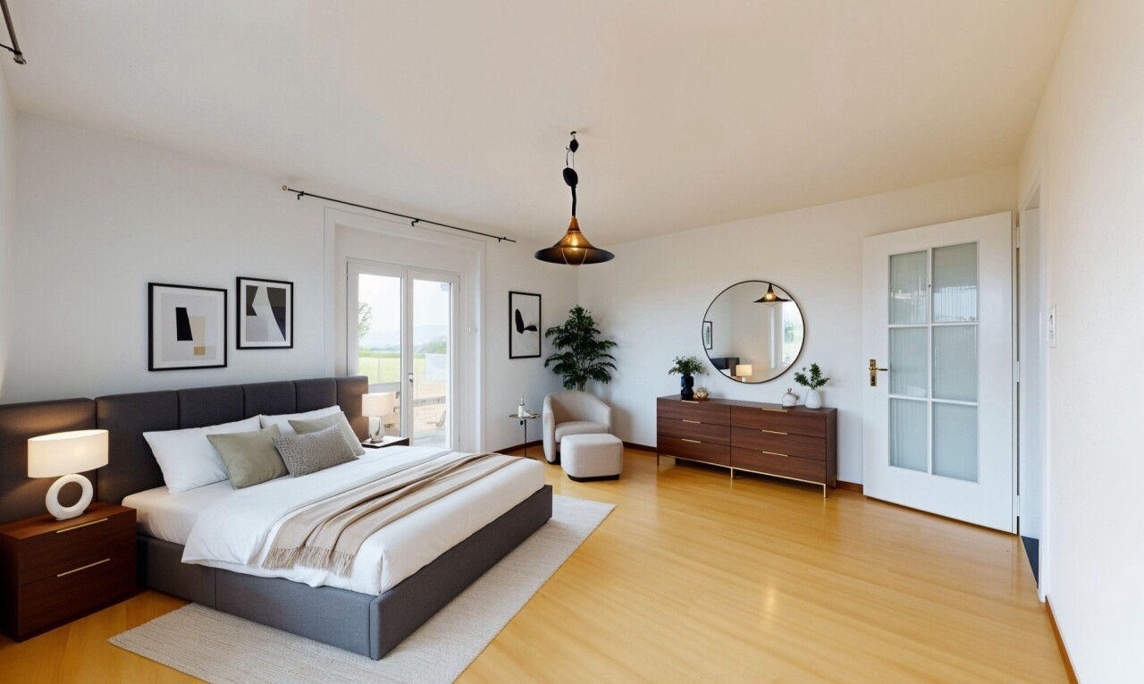 chambre avec wood finish floor, natural light, sol en finition bois, lumière naturelle, et drywall