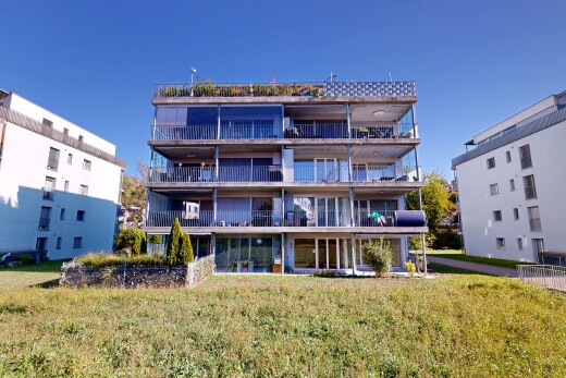 extérieur du bâtiment avec day time, apartment complex view, et vue sur le complexe d'appartements