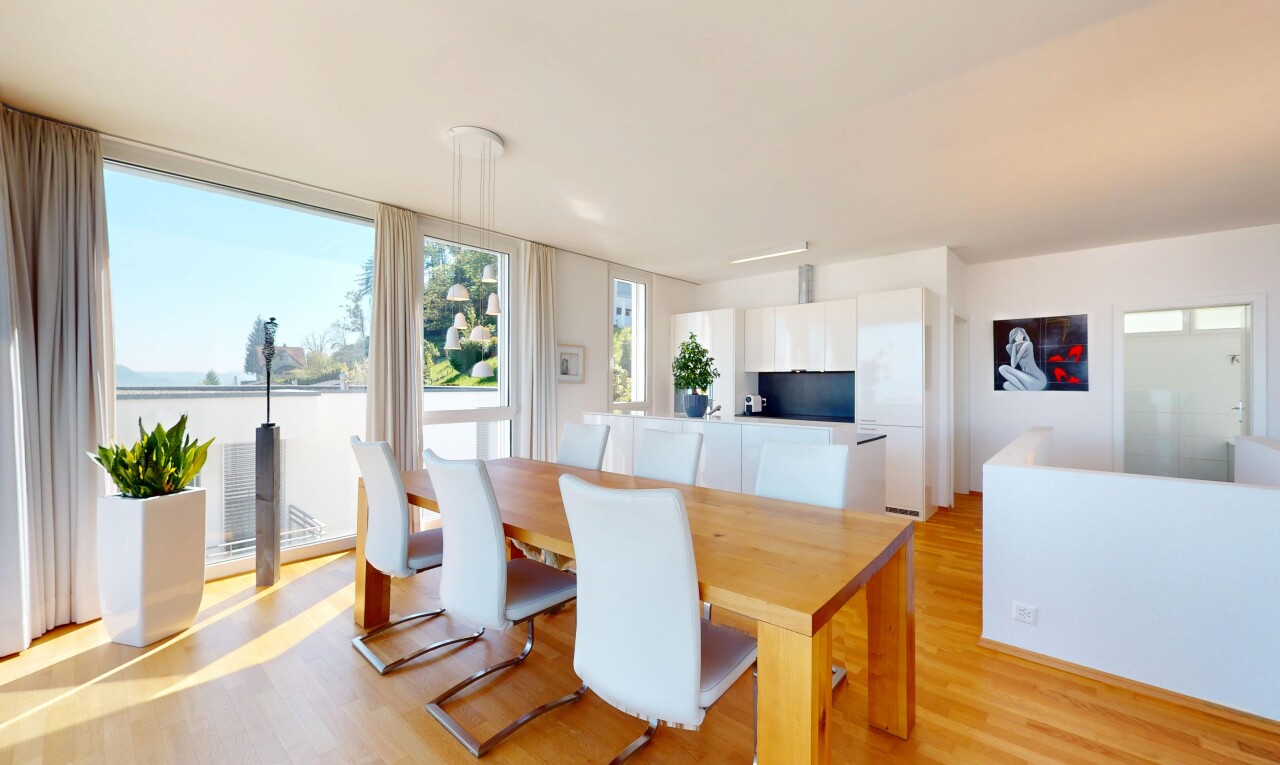 dining space featuring light wood-style flooring