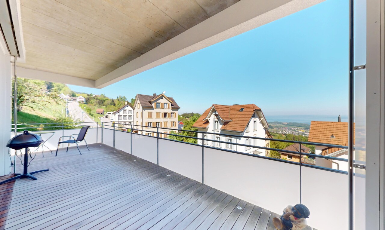 terrace with a residential view and a balcony