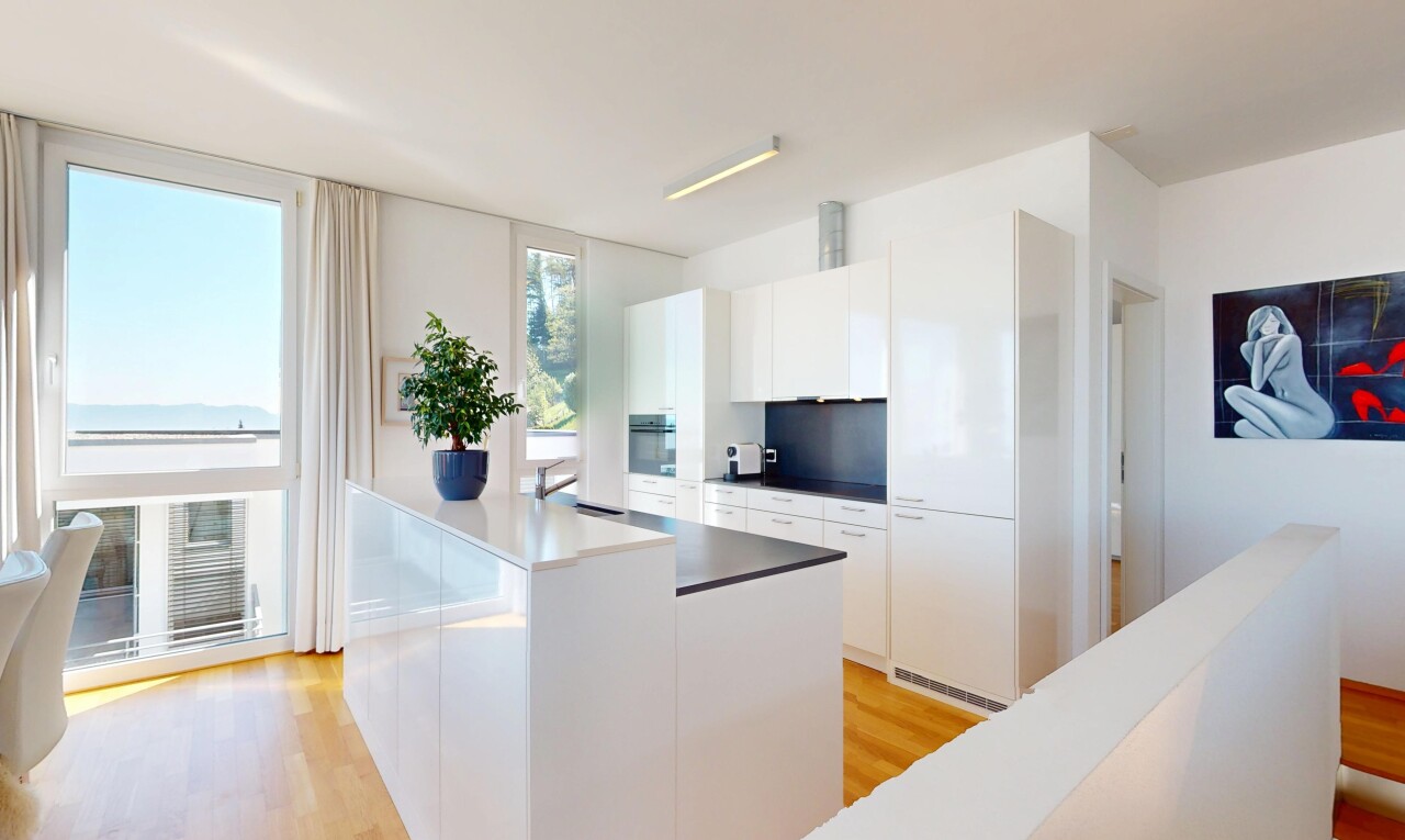 kitchen with white cabinets, modern cabinets, and light wood finished floors