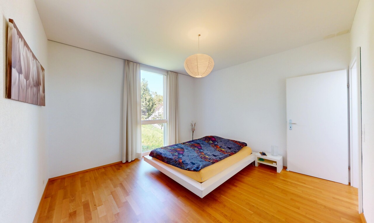 room with light wood-type flooring