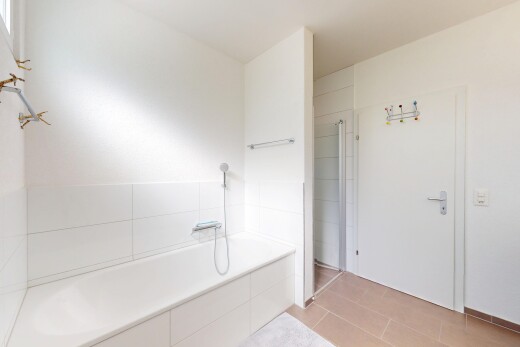 full bathroom featuring walk in shower and a bath