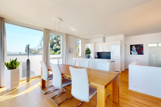 dining space featuring light wood-style flooring