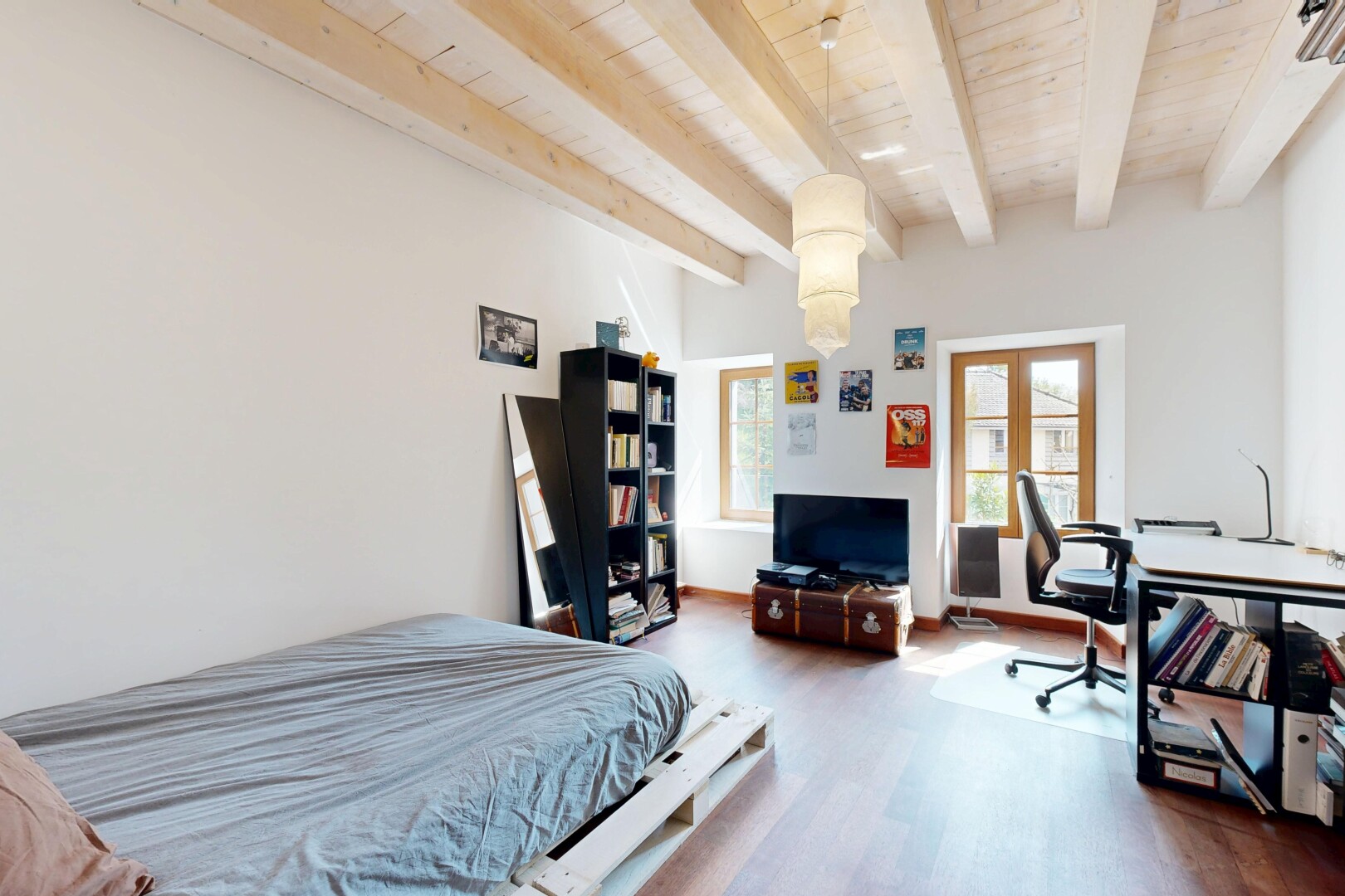 room / bedroom featuring wood finished floors, french doors, wooden ceiling, and beam ceiling