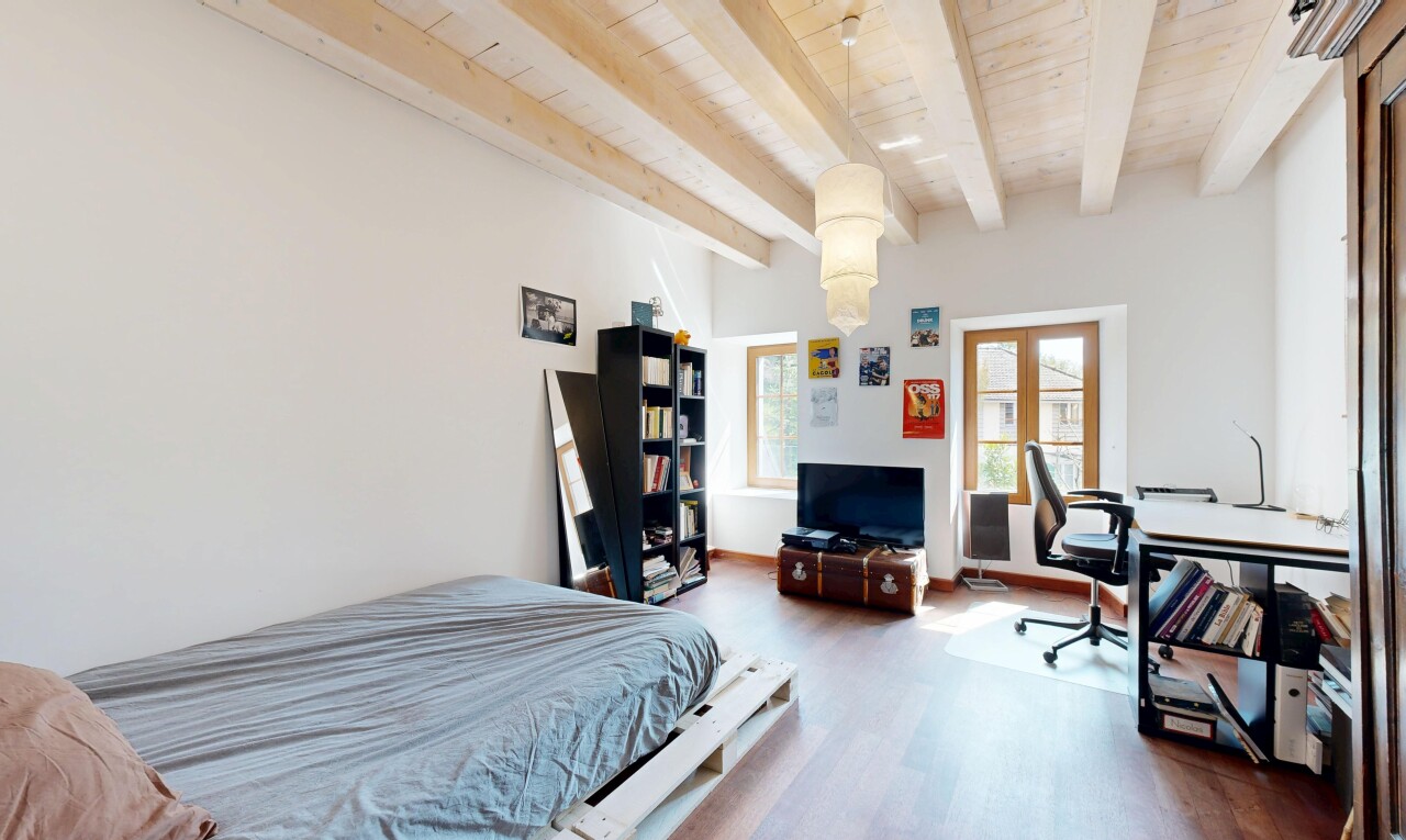room / bedroom featuring wood finished floors, french doors, wooden ceiling, and beam ceiling