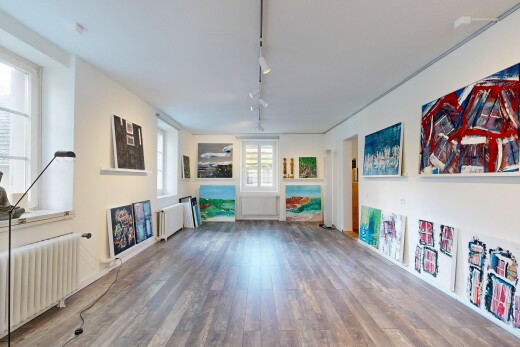 halle / korridor mit kühler, drywall, gipskartonwand, wood finish floor, und holzfußboden