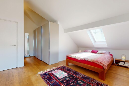 zimmer / schlafzimmer mit dachschräge, vaulted ceiling, dachfenster, zusätzliches zimmer, und holzfußboden