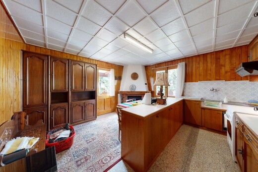 küche mit kamin, arbeitsplatten, light countertops, herd, und küchentheke