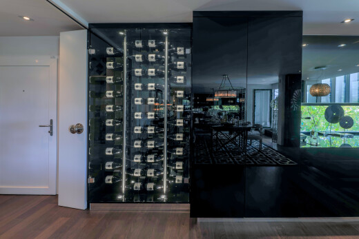 cave avec recessed lighting, éclairage encastré, wood finish floor, sol en finition bois, et natural light