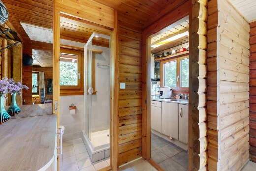 full bathroom featuring plenty of natural light, vanity, a shower stall, wooden ceiling, and tile patterned floors
