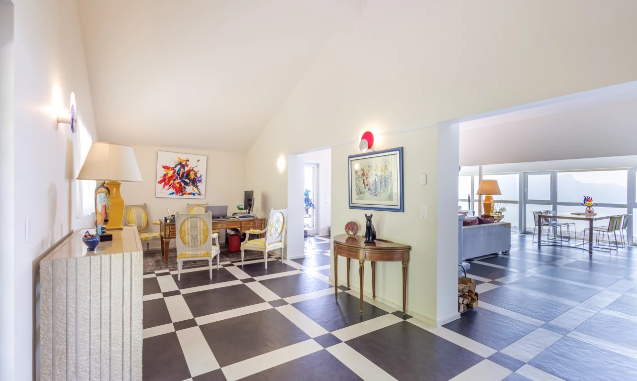 tiled office space with lofted ceiling