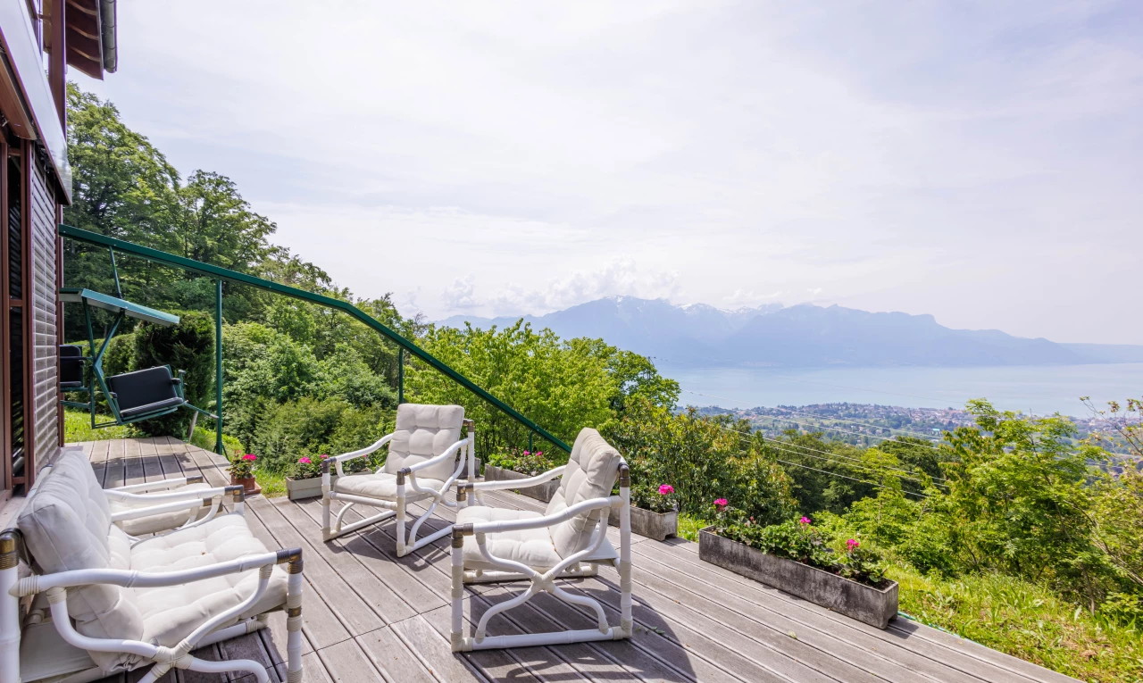 wooden terrace with a mountain view