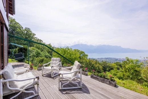 wooden terrace with a mountain view