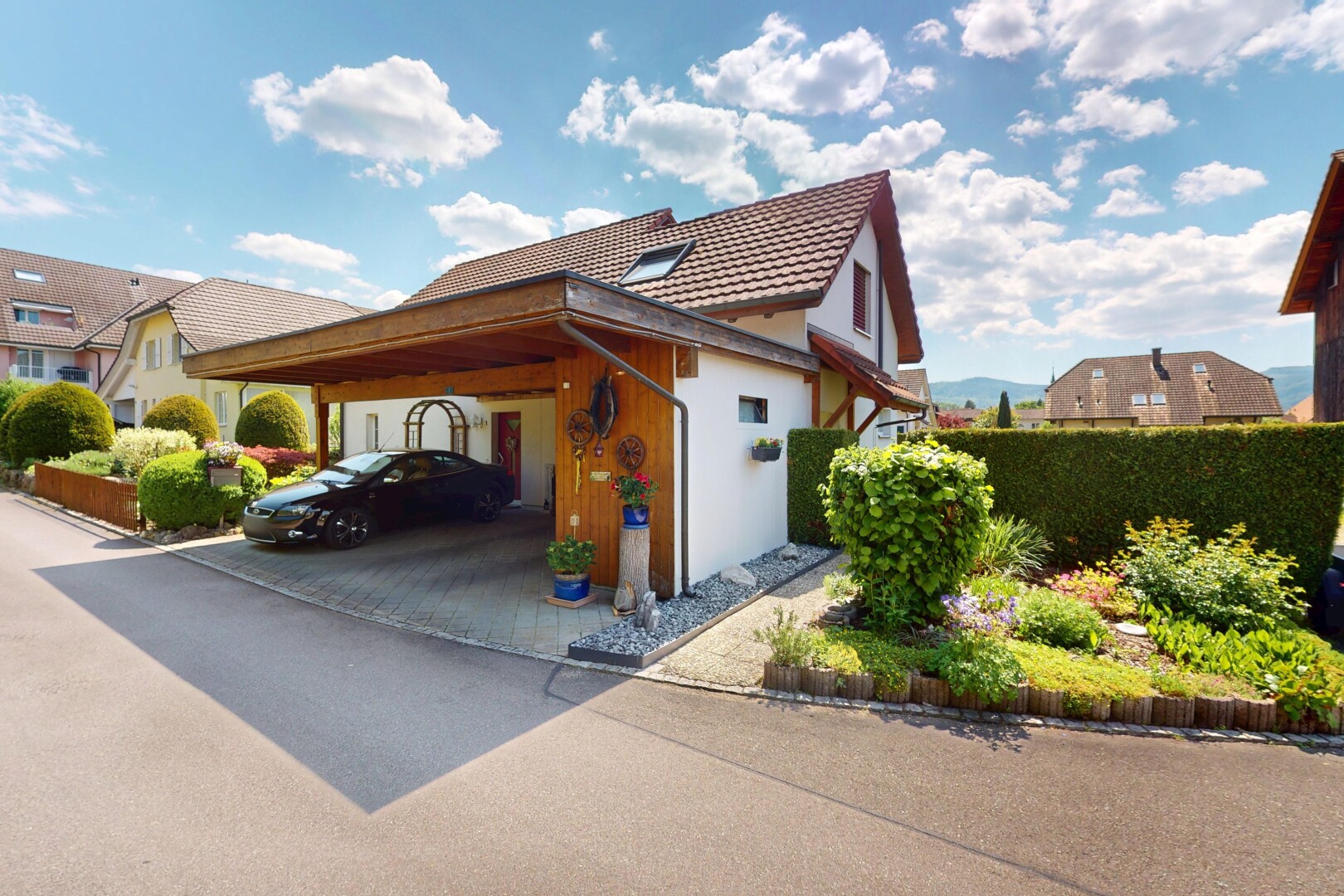 façade avec day time, bardage en stuc, et property visible