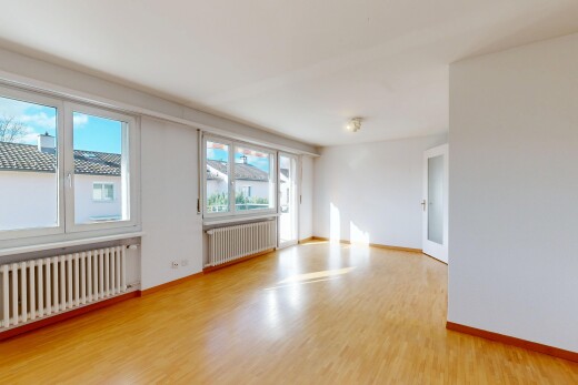 empty room featuring radiator and light wood-style floors