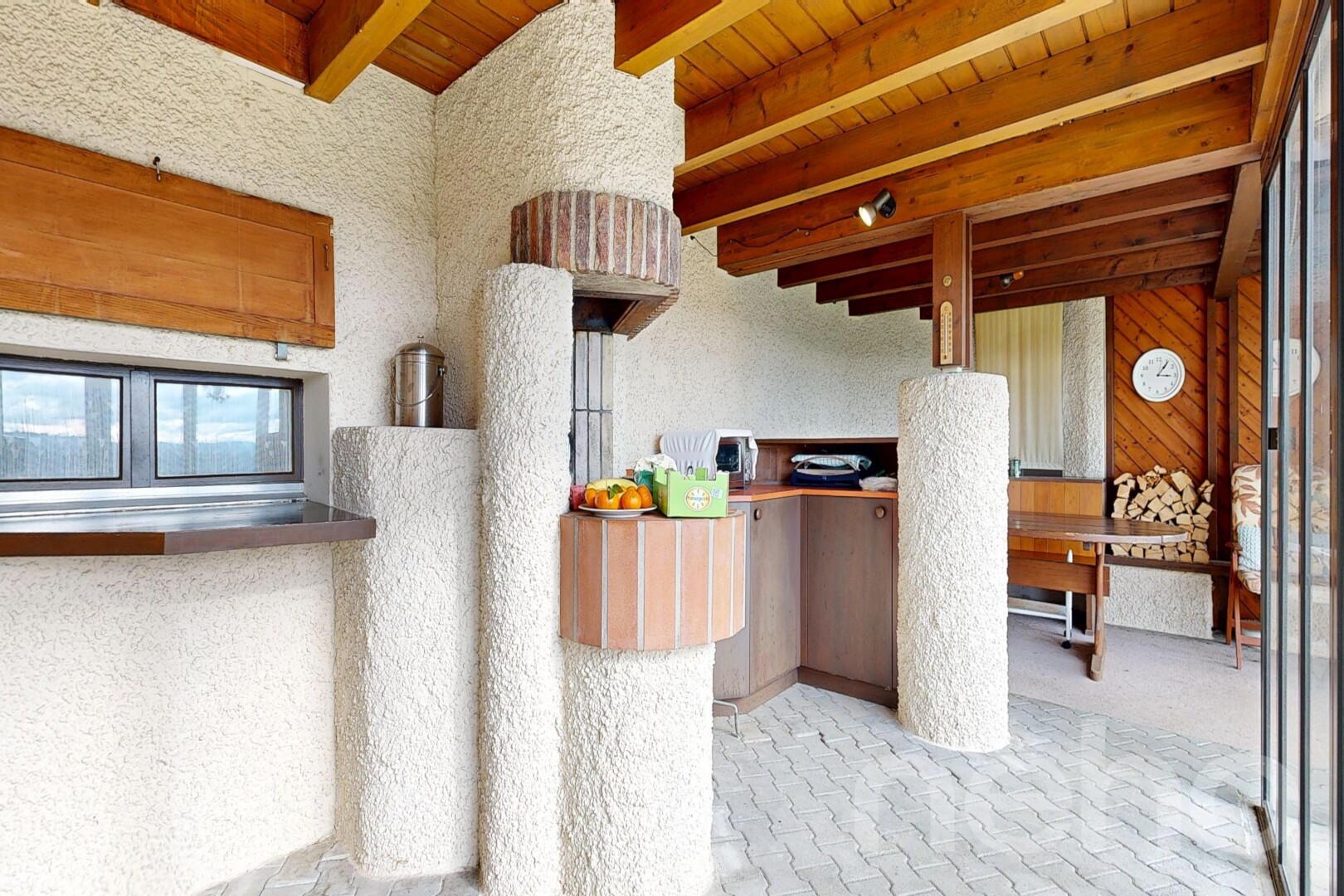 kitchen with a wood ceiling with exposed beams