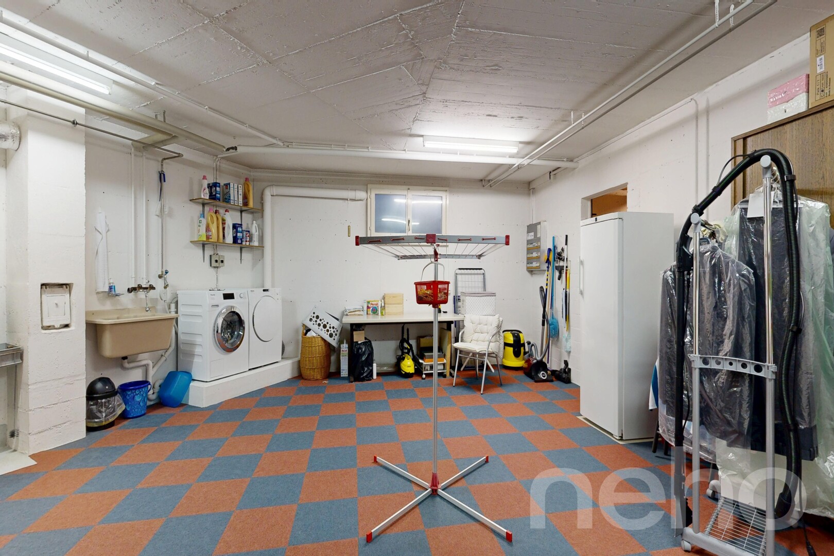 laundry area with washing machine and clothes dryer